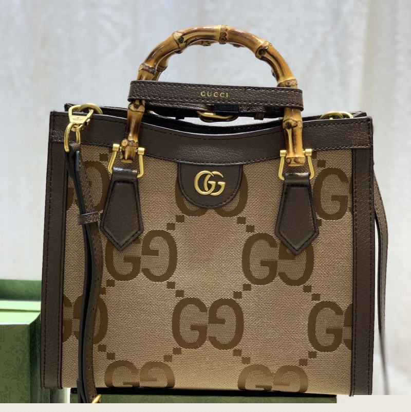 G*u*i top handle bags